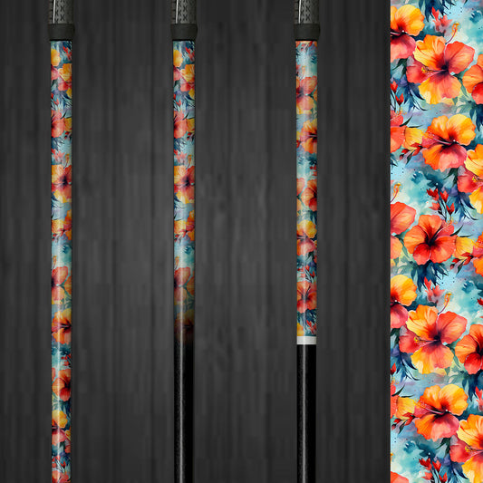 A golf club with a vinyl shaft wrap featuring vibrant hibiscus flowers. The wrap is applied smoothly, adding a beautiful and custom look to the club. The tropical floral design highlights the easy application and the elegant, personalized style it brings to the golf shaft.