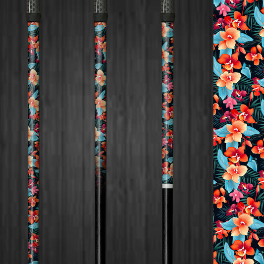 A golf club with a vinyl shaft wrap featuring bright orange, blue, and green orchids on a black background. The wrap is smoothly applied, adding a vibrant and custom look to the club. The bold floral design highlights the easy application and the eye-catching style it brings to the golf shaft.